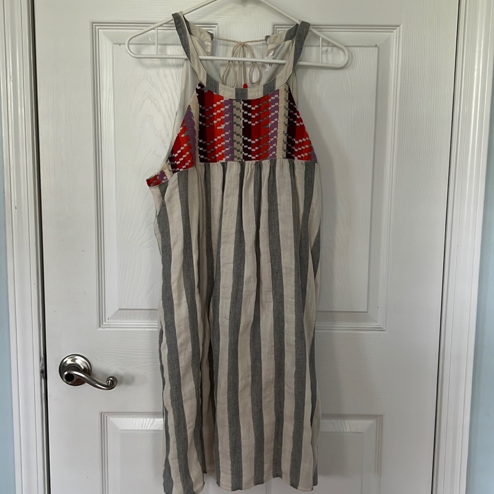 Size large grey and white striped halter dress. Never been worn